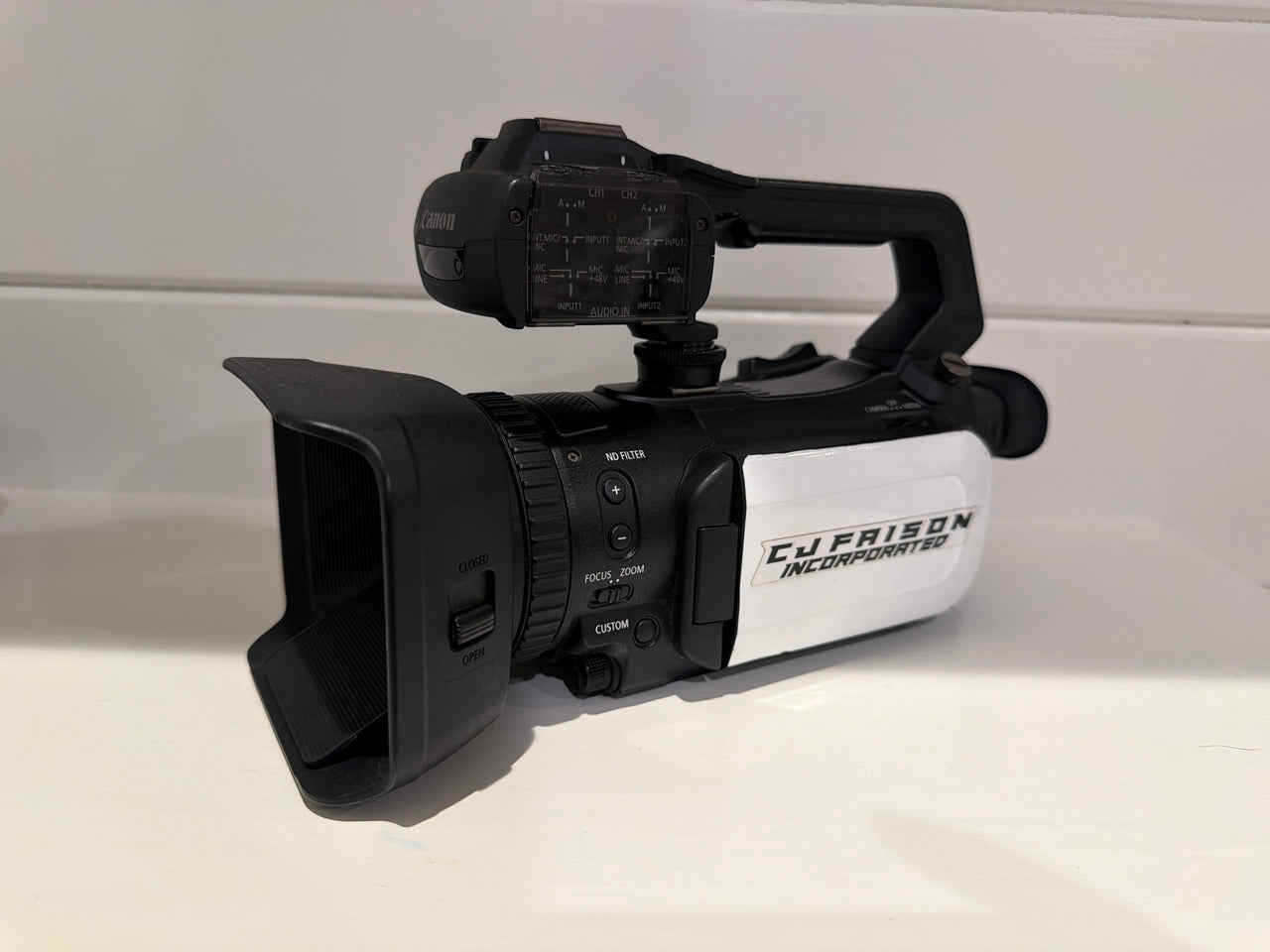 Used Canon AX11 (White CJ Faison Camera)